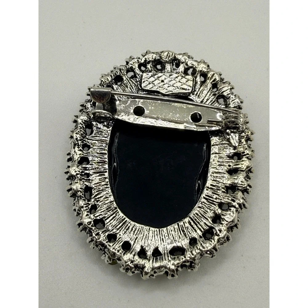 Vintage Cameo Brooch Black Resin Left Facing Silver Tone Rhinestone Surround